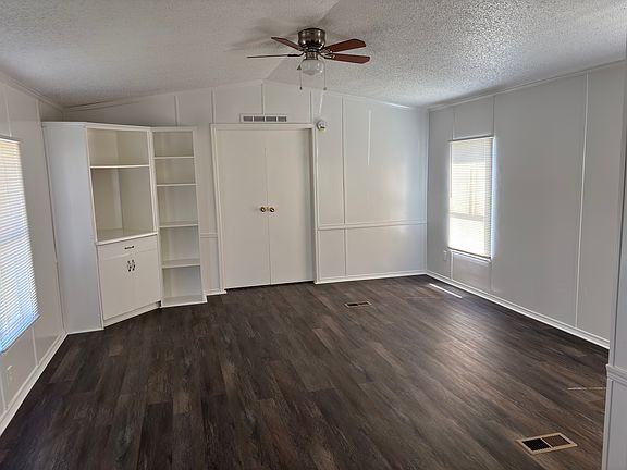 Spacious Living area with great built-ins for extra storage!