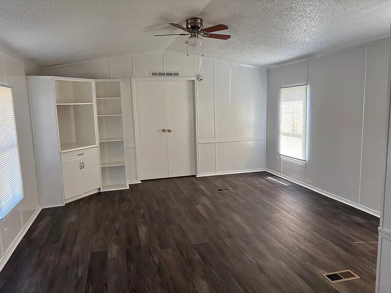 Spacious Living area with great built-ins for extra storage!