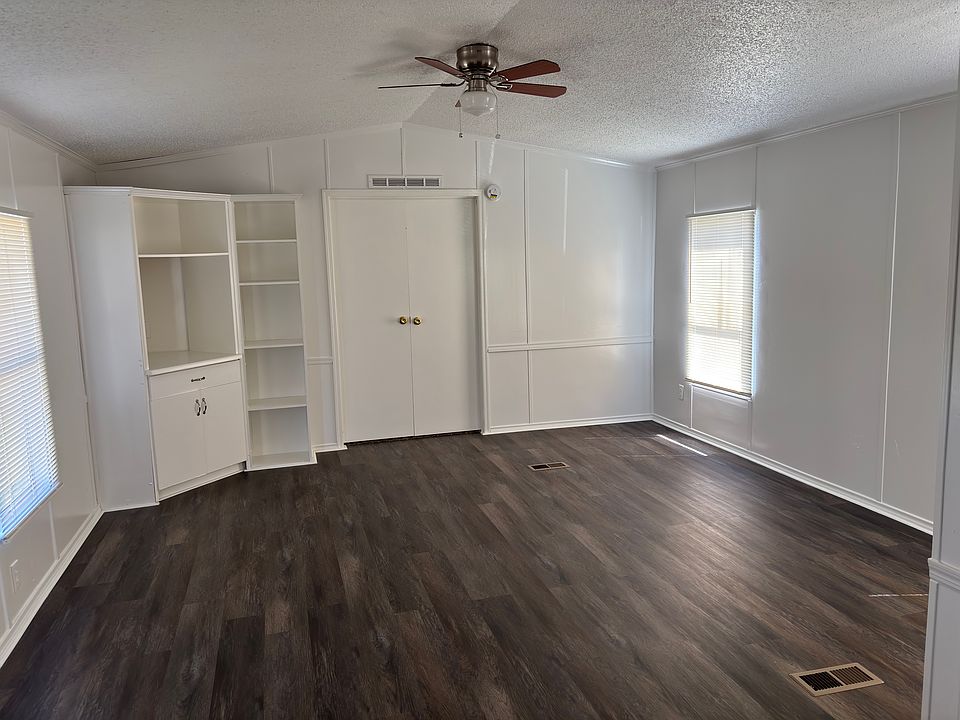 Spacious Living area with great built-ins for extra storage!