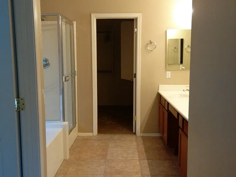 walk in closet/master bathroom