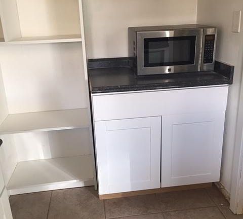 Kitchen Area for Microwave and Sheving Unit