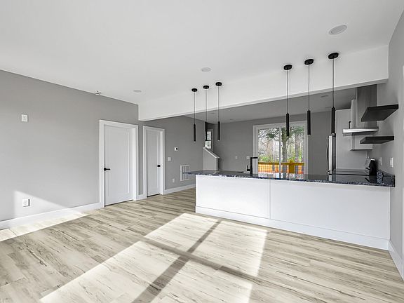 Open Floor Plan with 9 foot Ceilings.