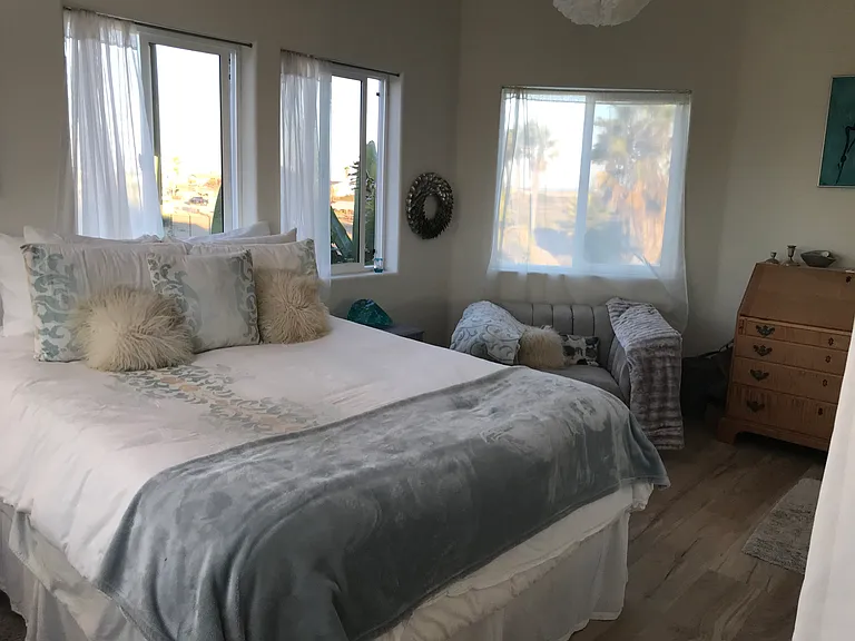 The master bedroom has its own bathroom and a large walk-in closet.