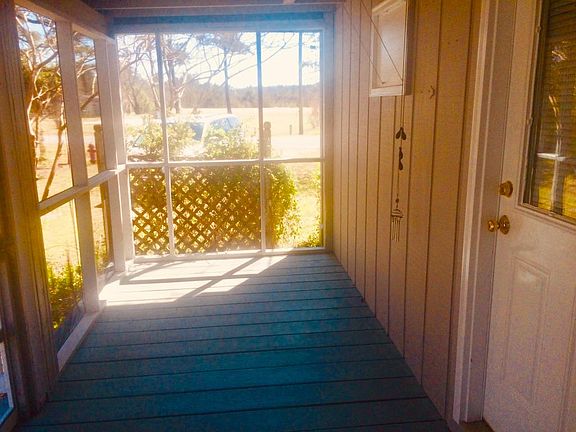 SITTING SIDE OF PORCH