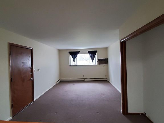 Living area with another exit to front of building