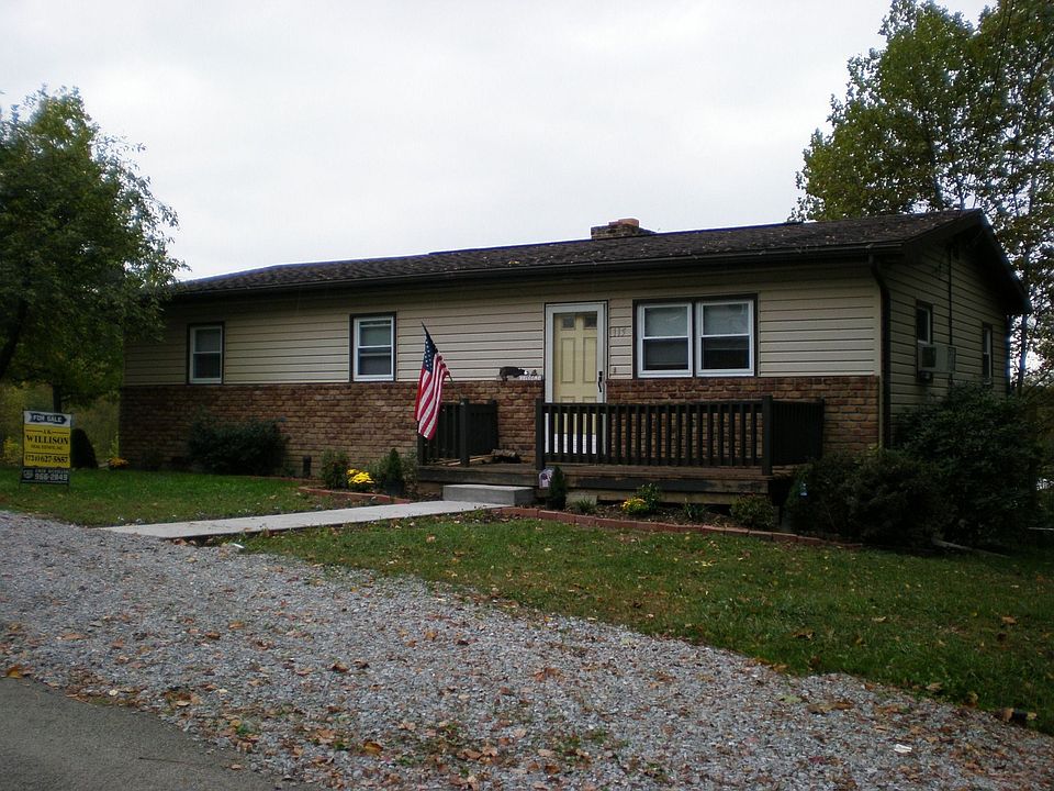 Front view and parking area. New roof.