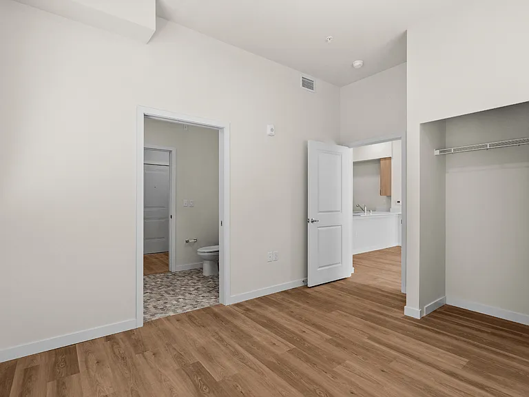 Enjoy a comfortable bedroom retreat with modern finishes, ample closet space, and an attached bathroom for added convenience.