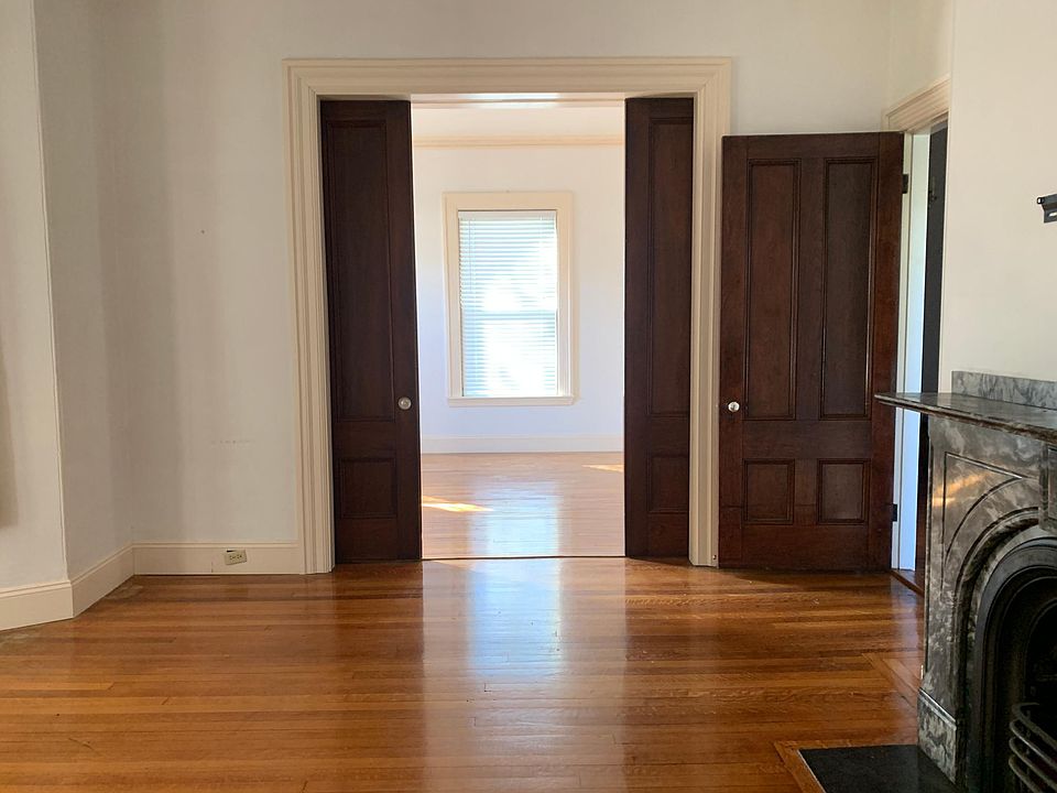 Pocket doors connecting living room and dining room