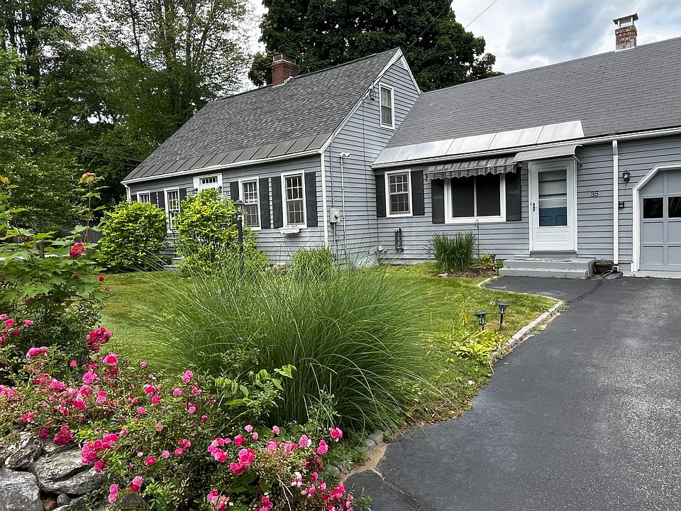 Front of house (main entry is the door adjacent to the driveway).