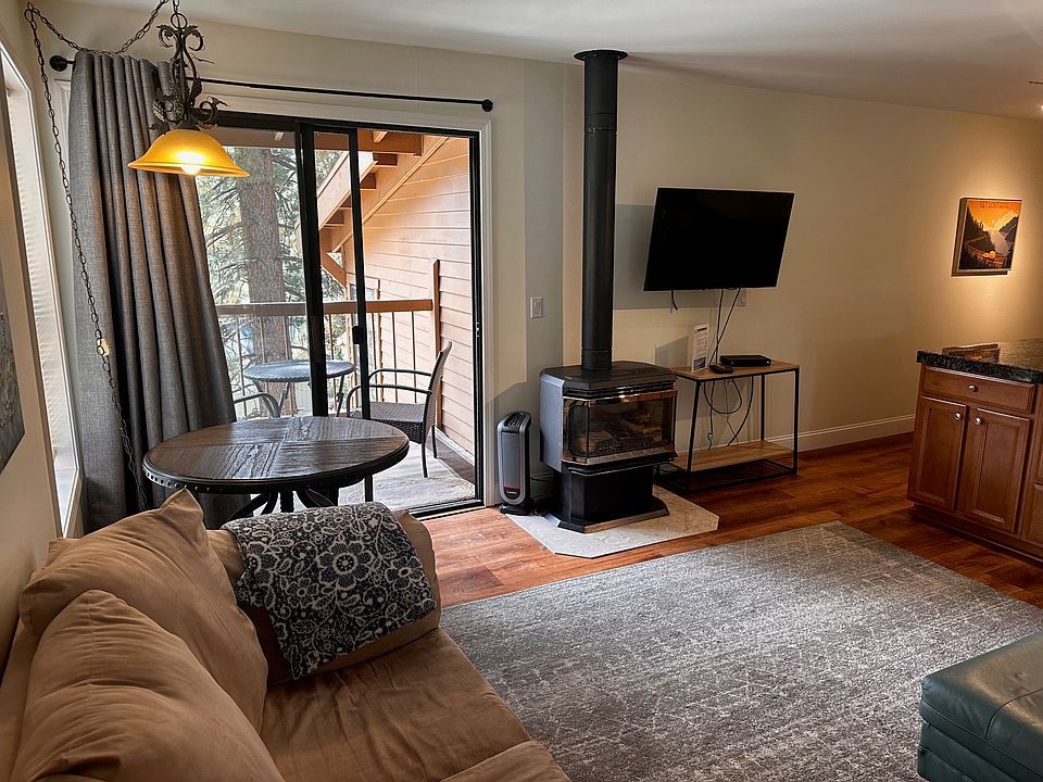 Living area with exterior deck and gas fireplace