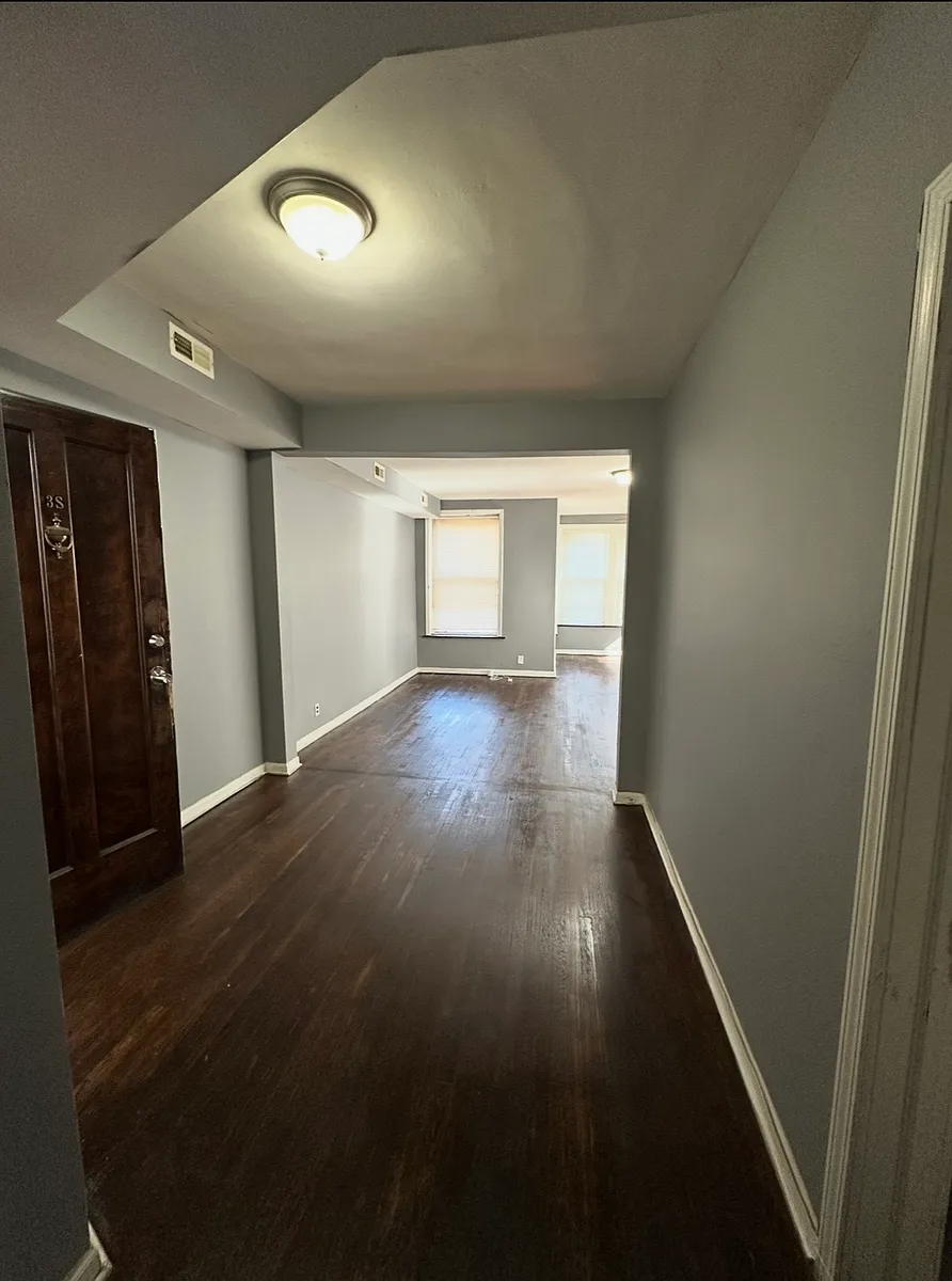 Building Photo - 6816 S Cornell Ave #3S