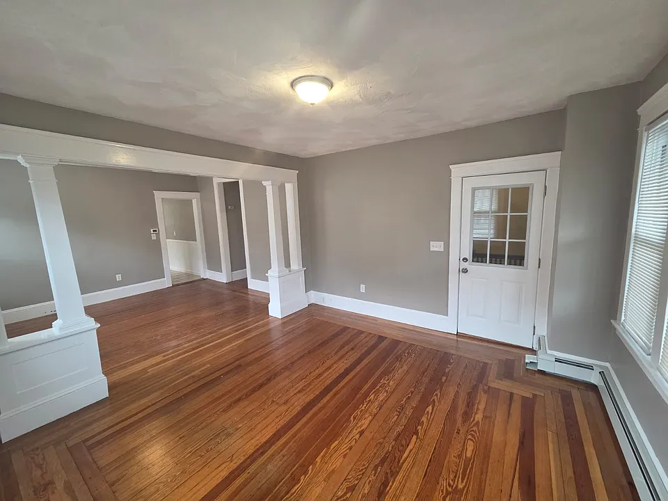 Double parlor view, providing comfort, for dining, entertaining, relaxing, working from home etc.