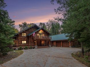 13418 Cecil Bay Rd, Carp Lake, MI 49718