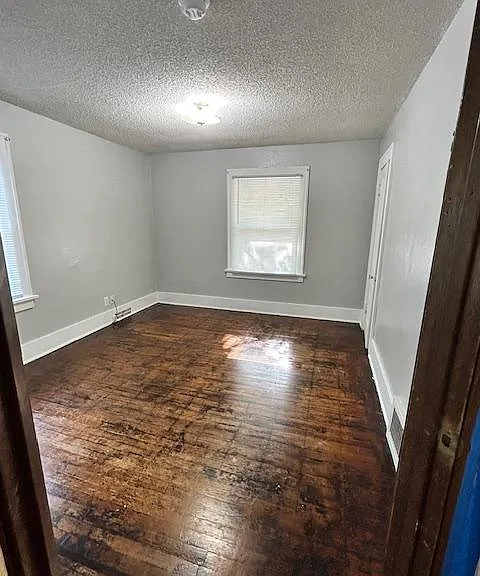 Main living area. Window is a west window that faces the street (front of house). Lots of natural light. Has closet if wanted to use as bedroom.