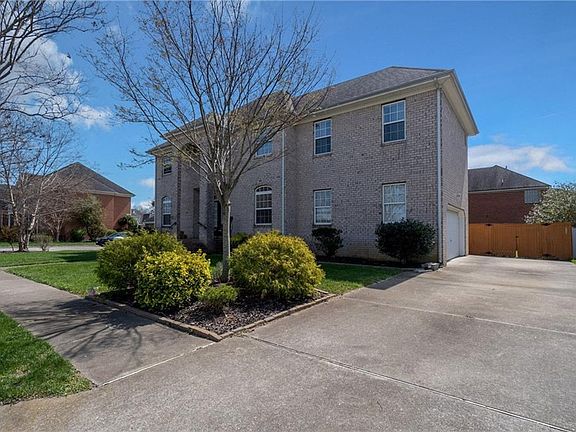 2 car garage with plenty of driveway space.