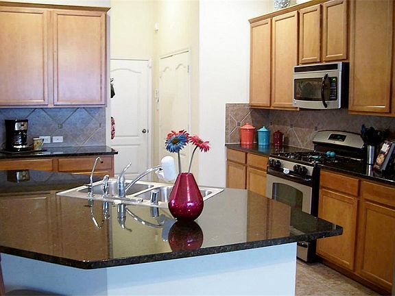 HUGE island, Stainless appliances.