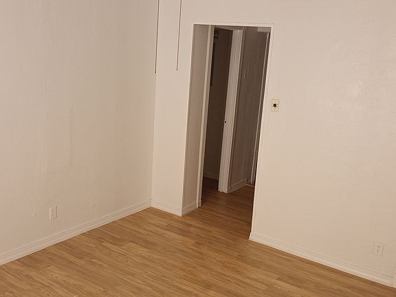 Living room, entrance to hall