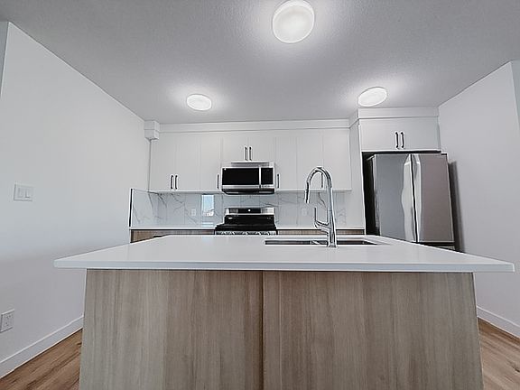 2nd image of 6035 105th St NW Unit 1