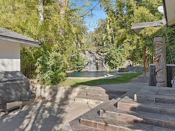 Amazing tropical pool with barbecue area