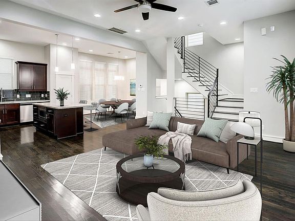 VIRTUALLY STAGED - Open concept living, dining, kitchen with high ceilings, amazing natural light and smart finishes.
