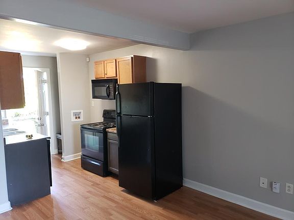 Picture of kitchen area and back door.