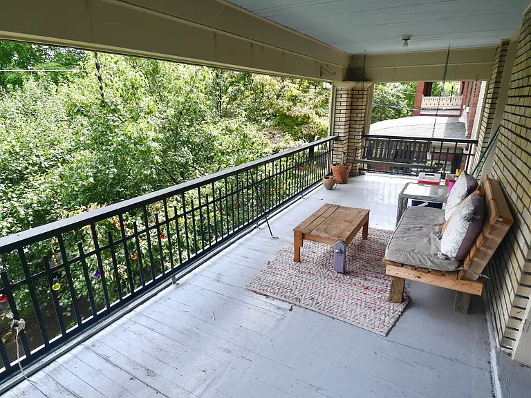 Seating area on Porch with swing