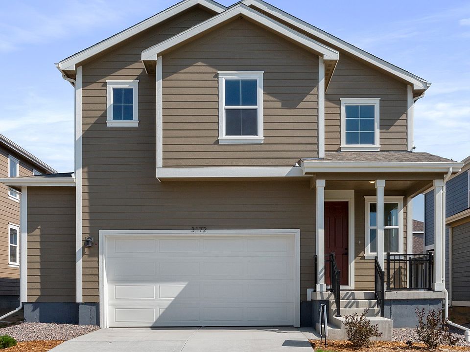 Exquisite modern design with pristine dark taupe siding and dark trim accents in lush suburban locat