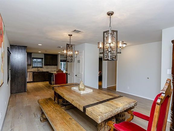 The dinning room is just waiting for your family and friends with hard wood flooring and upgraded white oak flooring this is sim