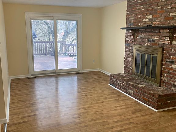 Family room with wood fireplace
