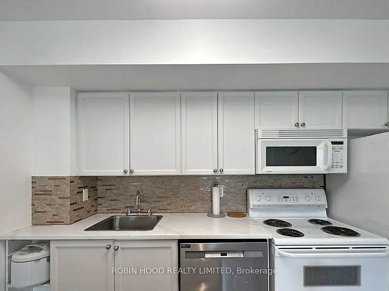 30 Harrison Garden Blvd #30 — Photo 9