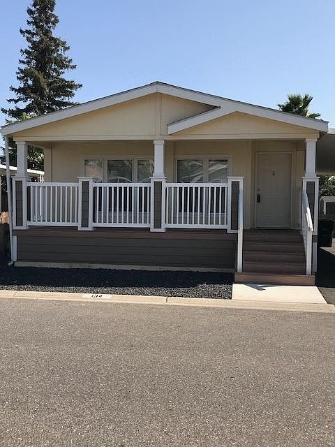 Charming 2016 Fleetwood home featuring two bedrooms, 2 bathrooms, an open and inviting floor plan, vaulted ceilings and much more!  The space rent will be $677.15 plus some utilities according to the park manager.  With a convenient location not far from the clubhouse and park, this one is a winner!