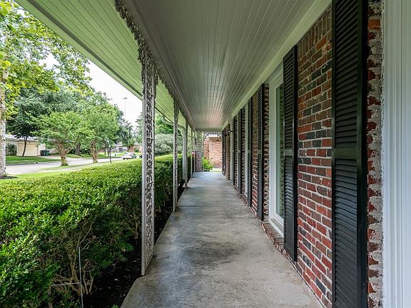 Can you imagine putting some fabulous wicker chairs or a swing on this wonderful porch?