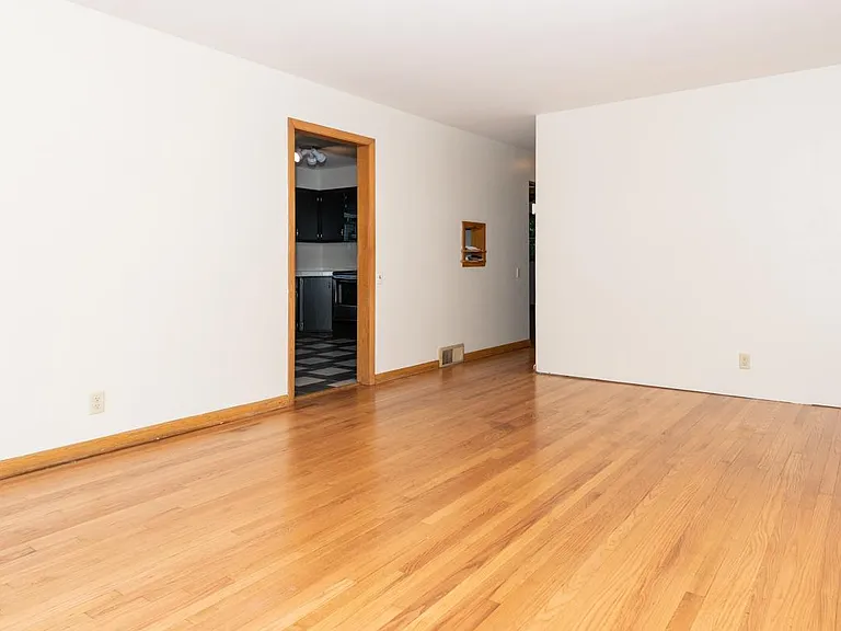 Large living room with hardwood floors.
