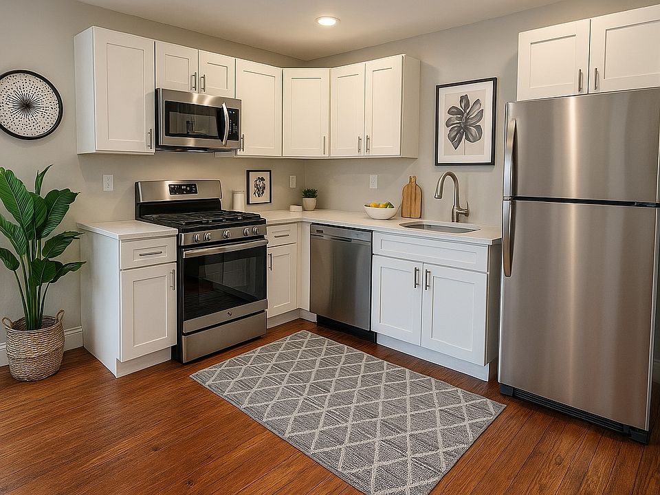 Kitchen with dishwasher, garbage disposal, and microwave
