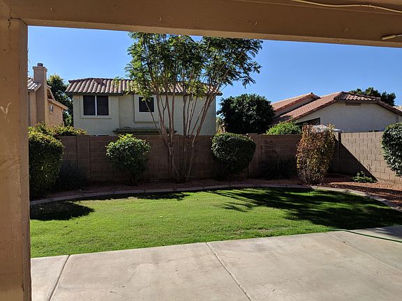 Beautiful back yard and covered patio.