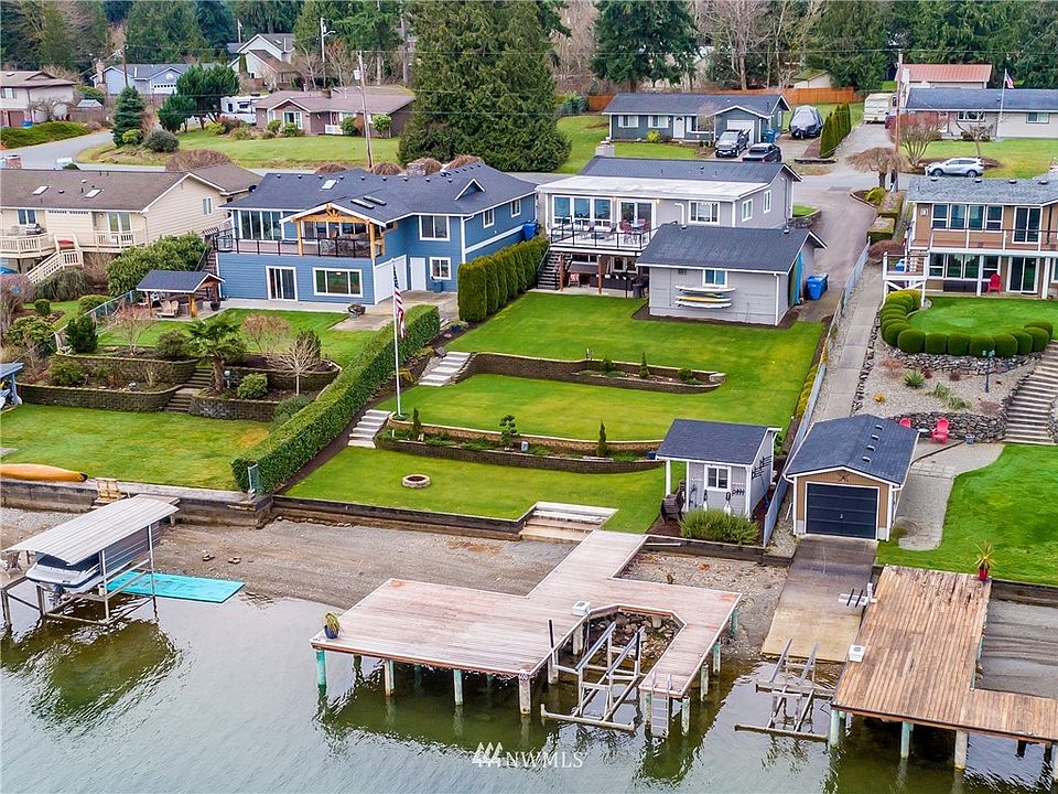 Beautiful property with 70' of no-bank waterfront