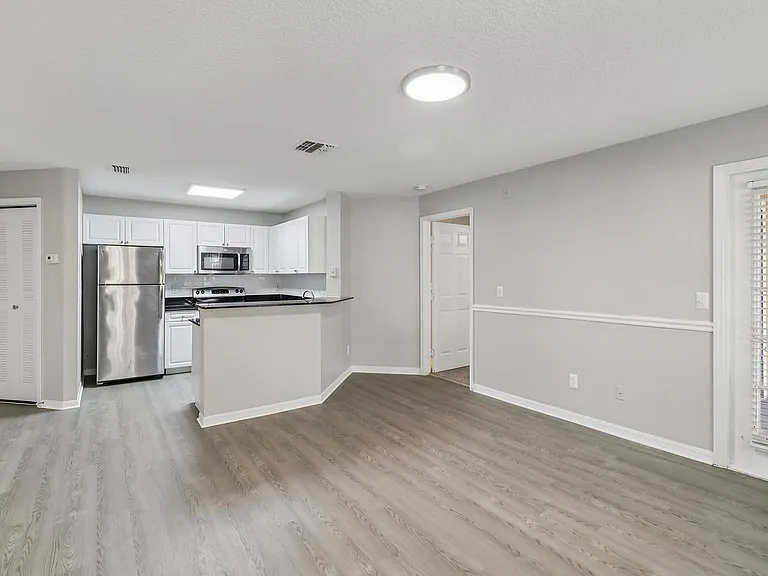 Spacious open-concept layout with kitchen and living area