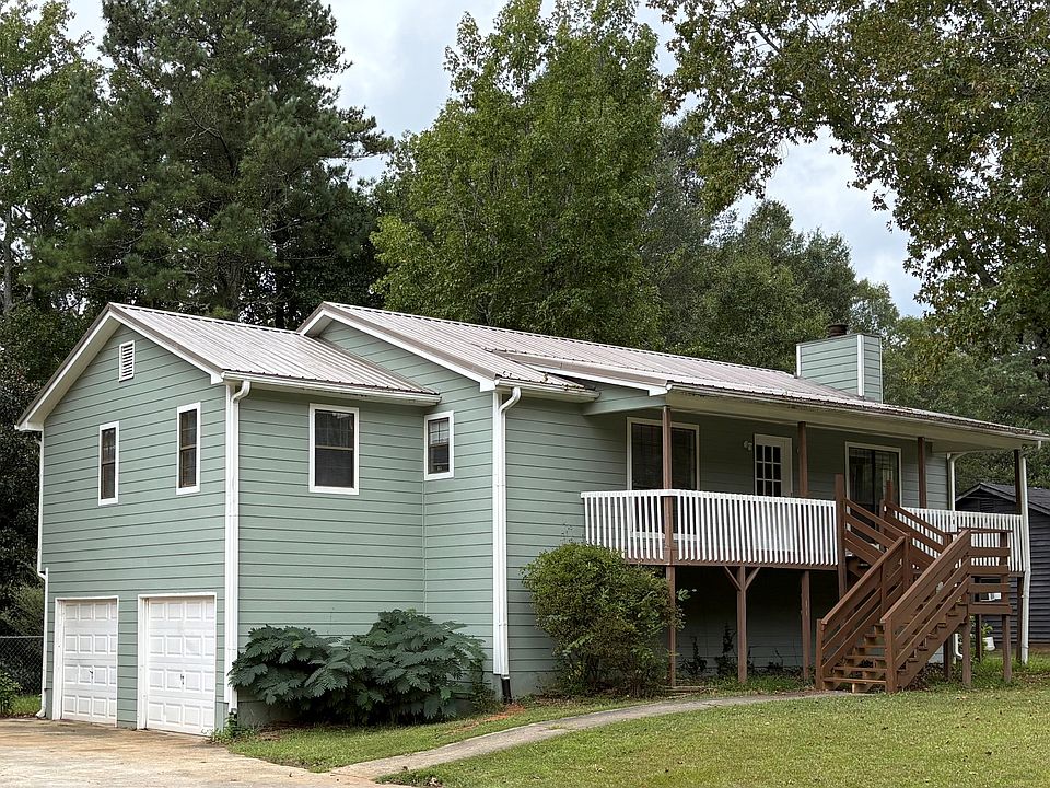 Remodeled 3-bed 2.5-bath, 2-car garage, new siding, metal roof, and a full basement for storage.