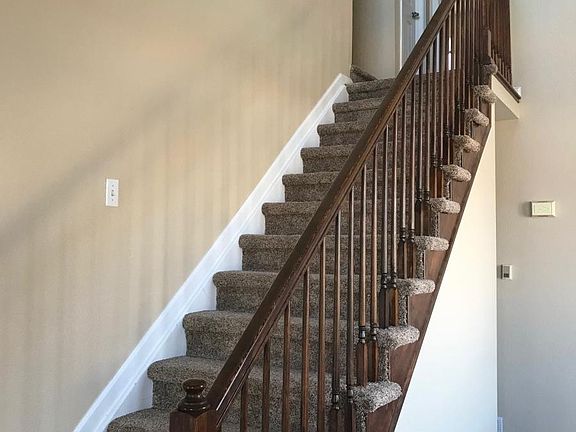 Stairs going up to bedrooms