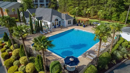 Bask in sun-soaked serenity by our expansive resort-style pool with a sprawling sundeck. - The Legends at Lake Murray