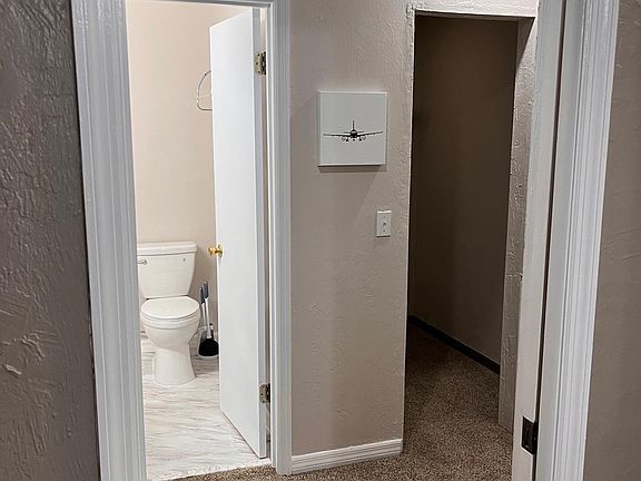 Step into the foyer, a gateway to boundless opportunities! With some storage already in place, envision the potential to customize with shelving for a pantry or to accommodate a mini-fridge, allowing you to curate your space to suit your unique needs and