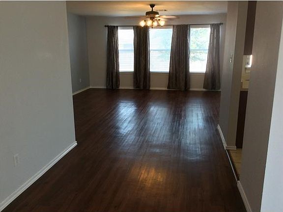 Although the fabulous flooring appears to be wood, it is actually vinyl planking, which makes mainte