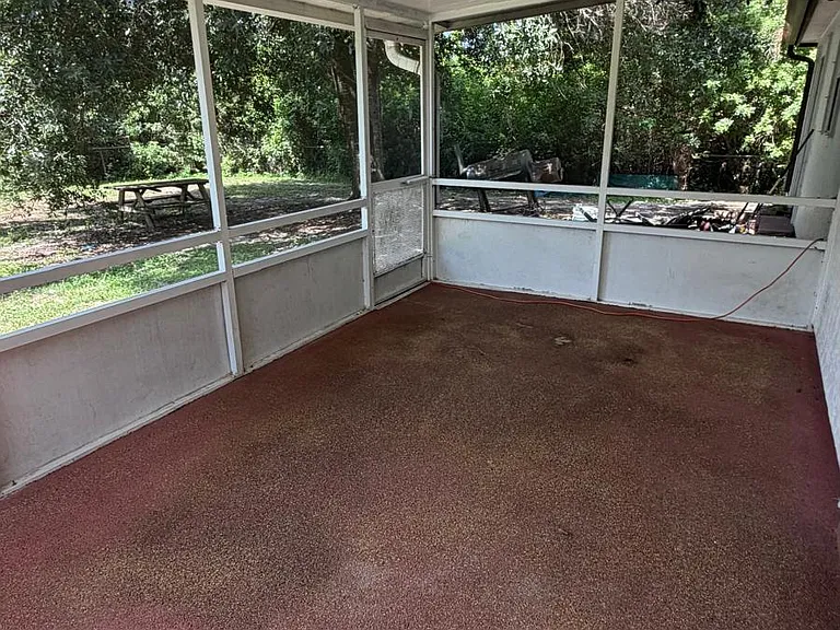 Very large screened in lanai with space for large table and chairs or other furniture