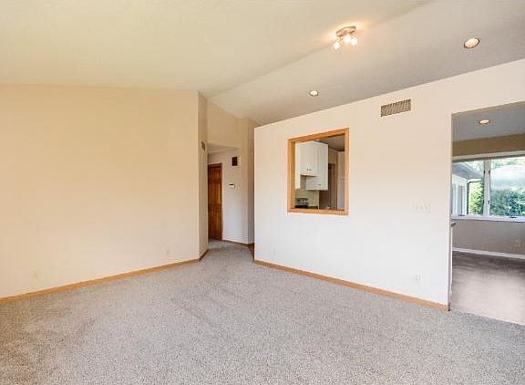 Open living room with vaulted ceilings