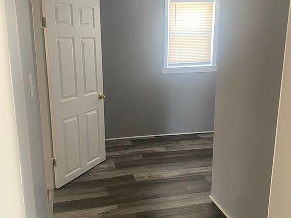 hallway to bed and bath