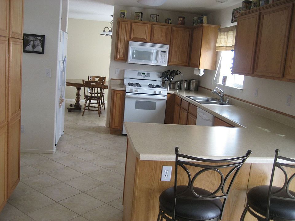 Tiled Kitchen, living and dining room