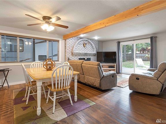 Dining room, formal living room and access to the backyard.