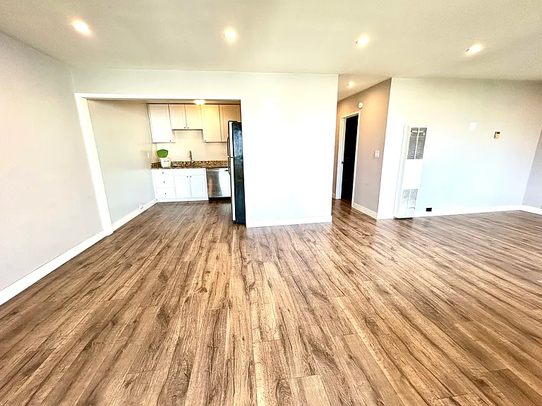 Kitchen and open living and dining area