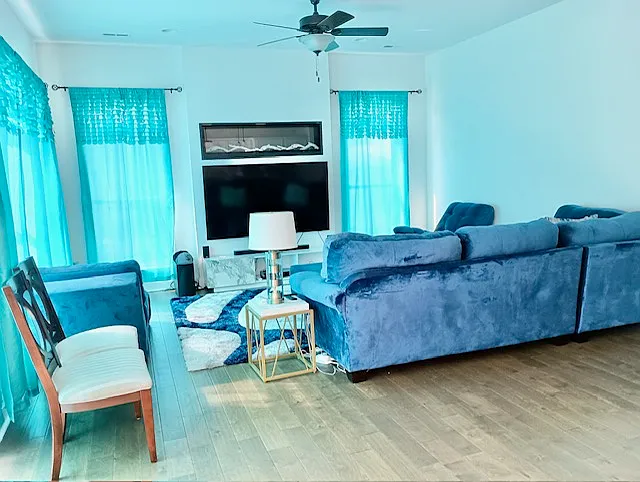 family room with electric fireplace