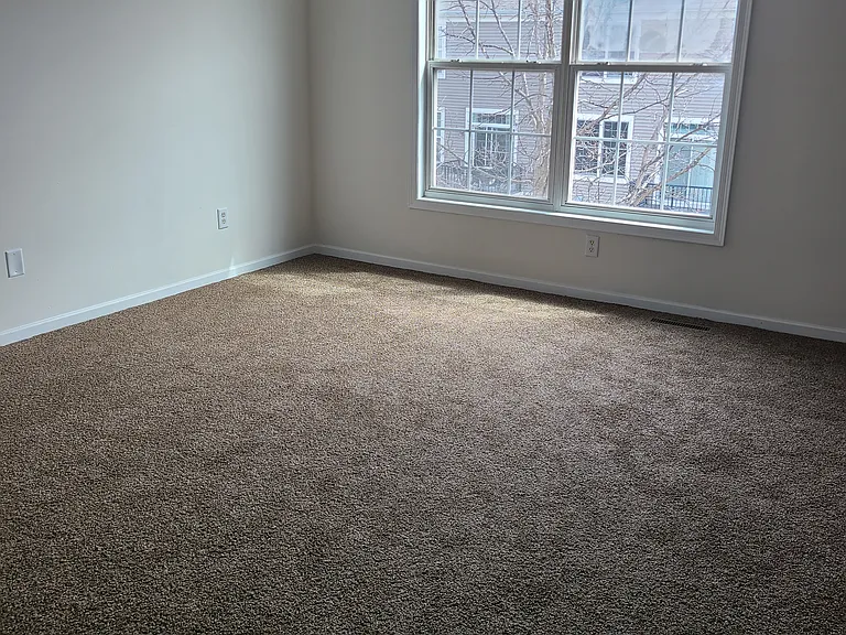 Carpeted bedroom